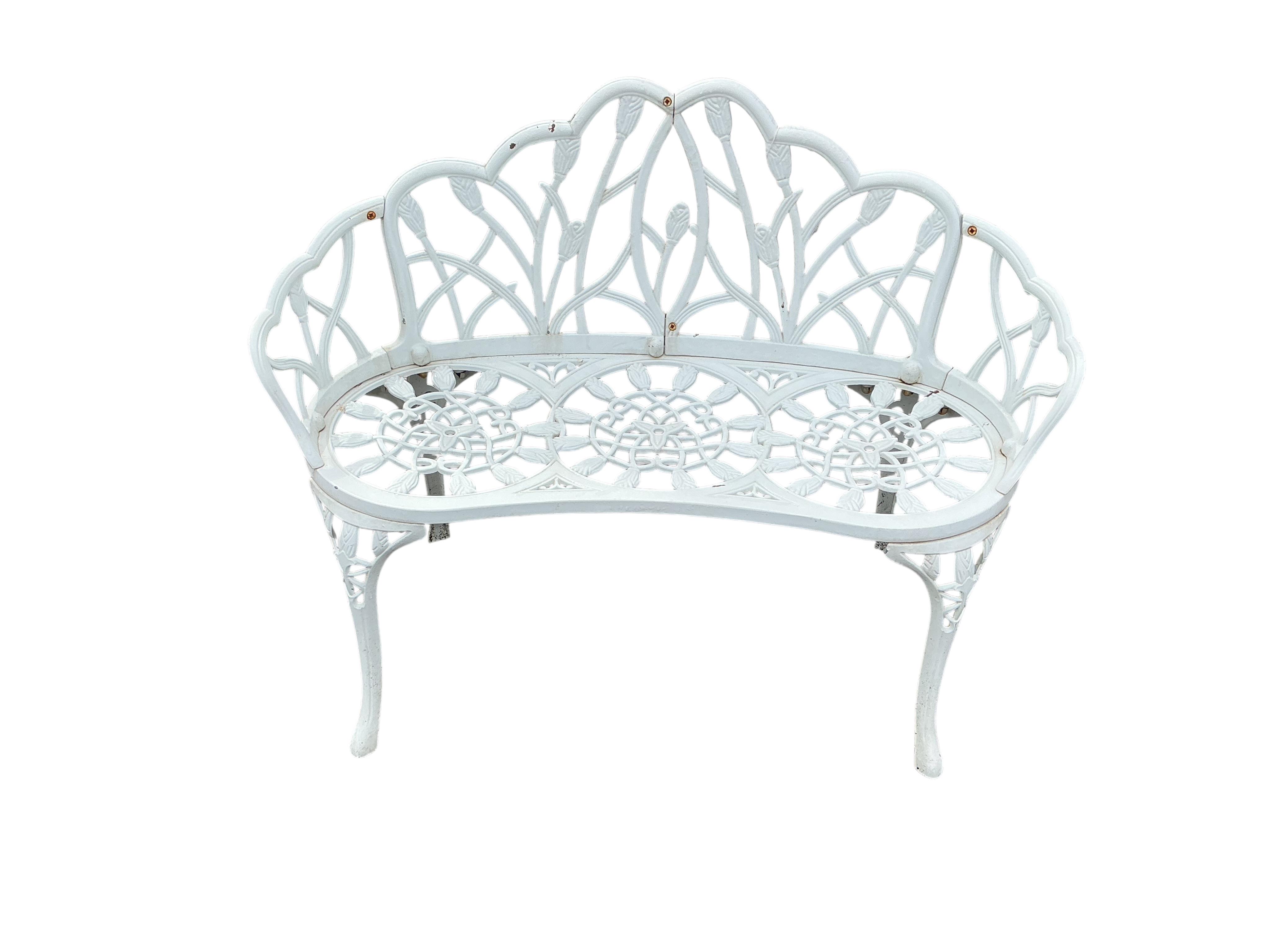 A pair of white painted aluminium garden benches, width 100cm, height 78cm and a similar rectangular glass topped table